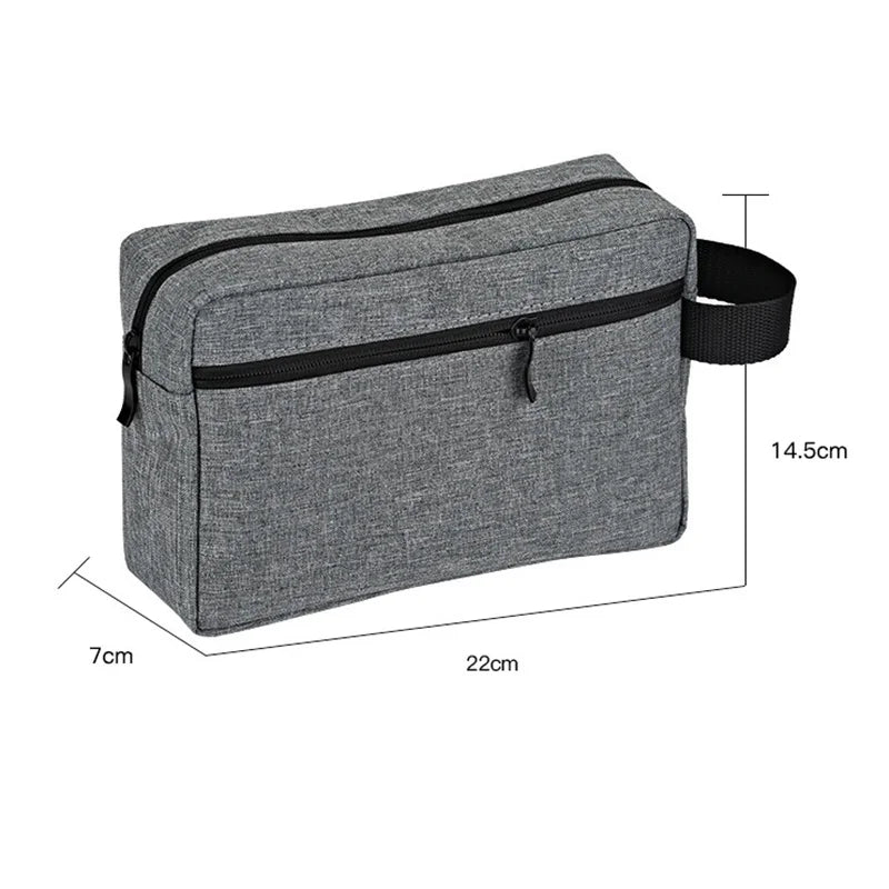 Sac organisateur de toilette imperméable gris avec fermeture éclair et sangle, vue de dessus.