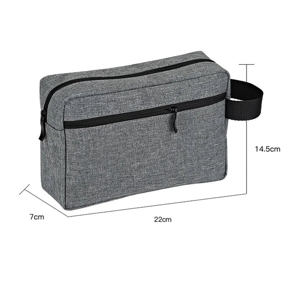 A gray waterproof toiletry organizer bag with a black zipper and strap, shown from the top.