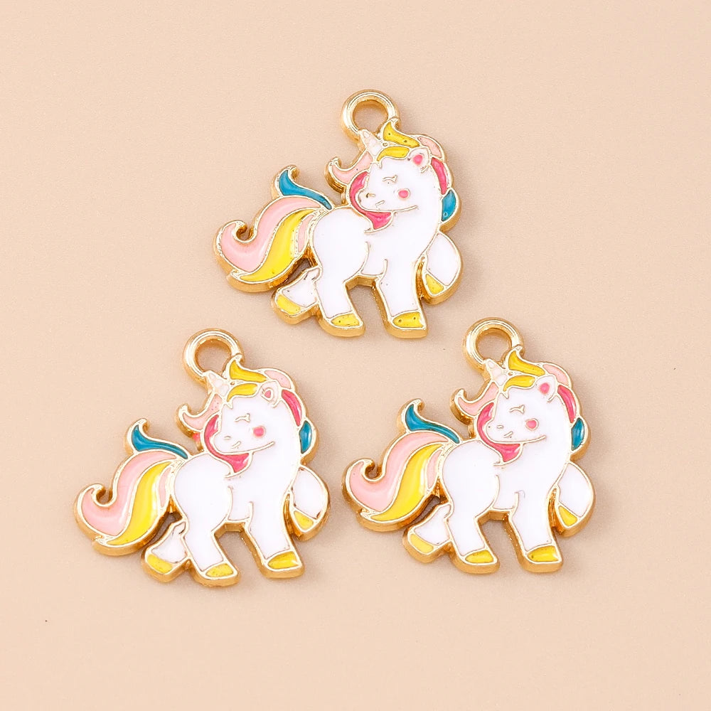 Two gold-toned unicorn horse charm pendants with pink and yellow rainbow accents.