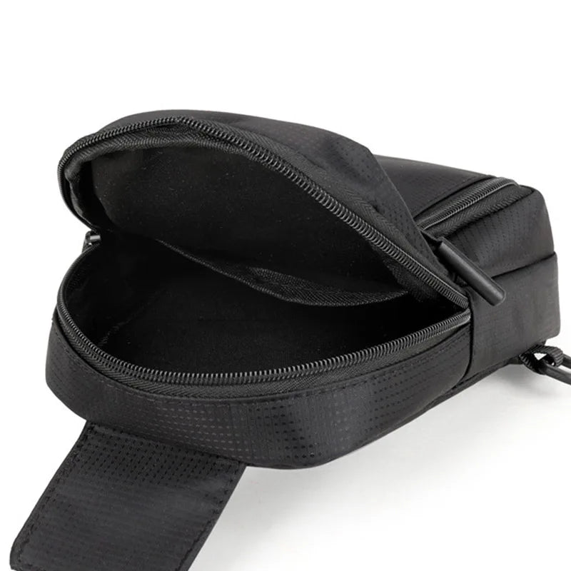 Black versatile unisex chest bag with a zippered opening and adjustable strap.
