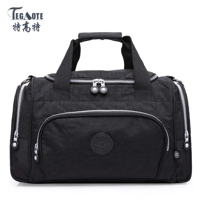 Black durable nylon travel duffle bag with zippered compartments and carrying handles