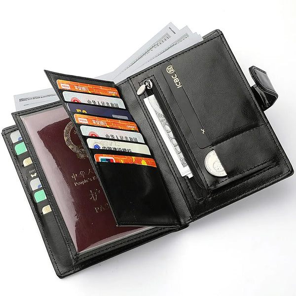 A black leather multi-card travel wallet is shown open, displaying various cards and a pen.