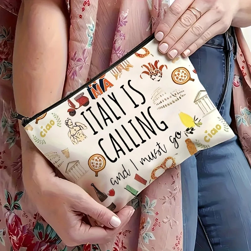 A beige makeup bag featuring an illustration of Italy and text that reads Italy is calling and I must go