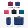 A collection of five colored foldable travel duffel bags shown in various shades including red, blue, black, and green.