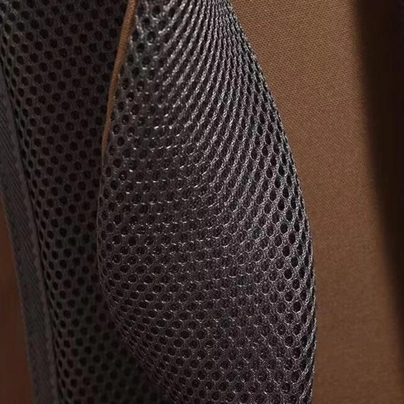Close-up view of a dark gray durable 80L waterproof hiking backpack fabric texture.