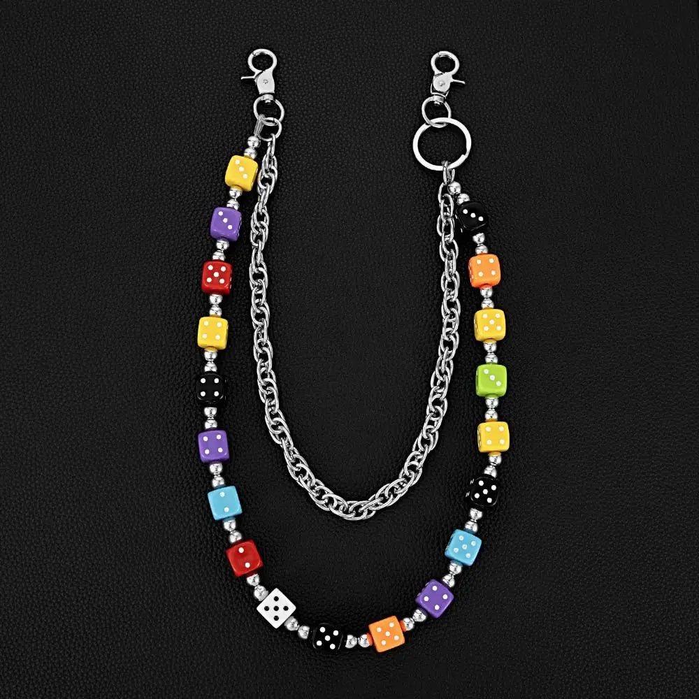 A silver chain necklace featuring colorful dice beads in various colors like yellow, purple, red, and black.