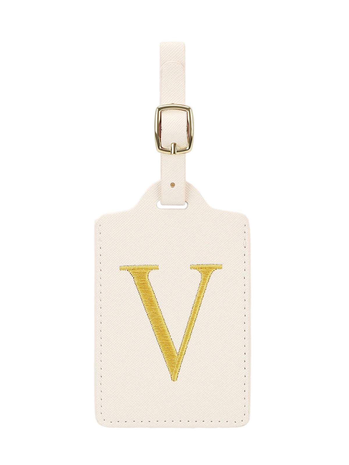 Étiquette de bagage en cuir crème avec un V brodé en or et une pince métallique argentée.
