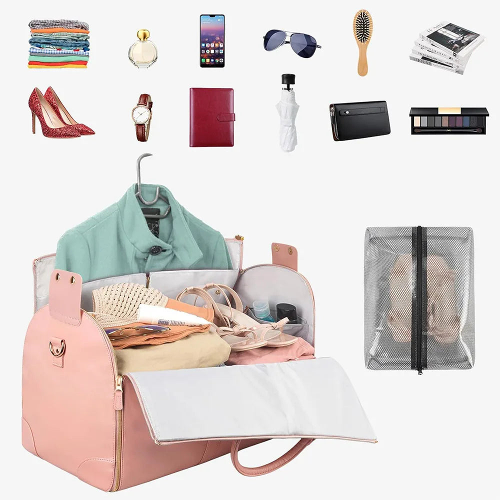 A collection of various accessories and a pink foldable garment duffle bag for travel.