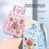 A light blue cartoon animal backpack with a multi-layer partition design and flap pockets.