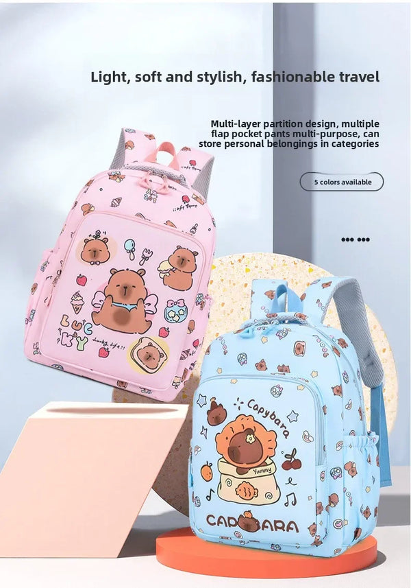 A light blue cartoon animal backpack with a multi-layer partition design and flap pockets.