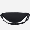Black adjustable nylon crossbody sling bag shown from the underside.