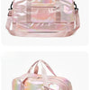 A pink iridescent nylon travel bag designed for fitness and gym use.