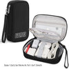 Black portable digital organizer storage pouch with a clear zippered compartment containing various electronic accessories
