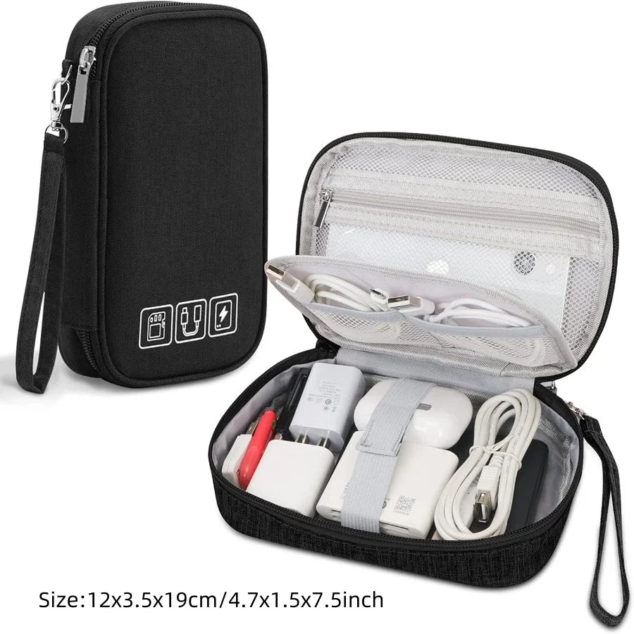 Black portable digital organizer storage pouch with a clear zippered compartment containing various electronic accessories