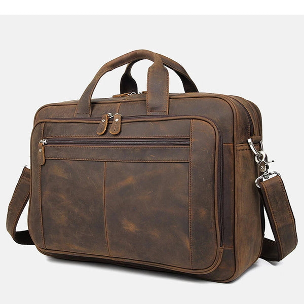 A brown genuine leather briefcase with a top handle and multiple compartments.