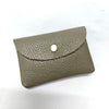 A folded olive green genuine leather card holder with a gold-toned stud closure.