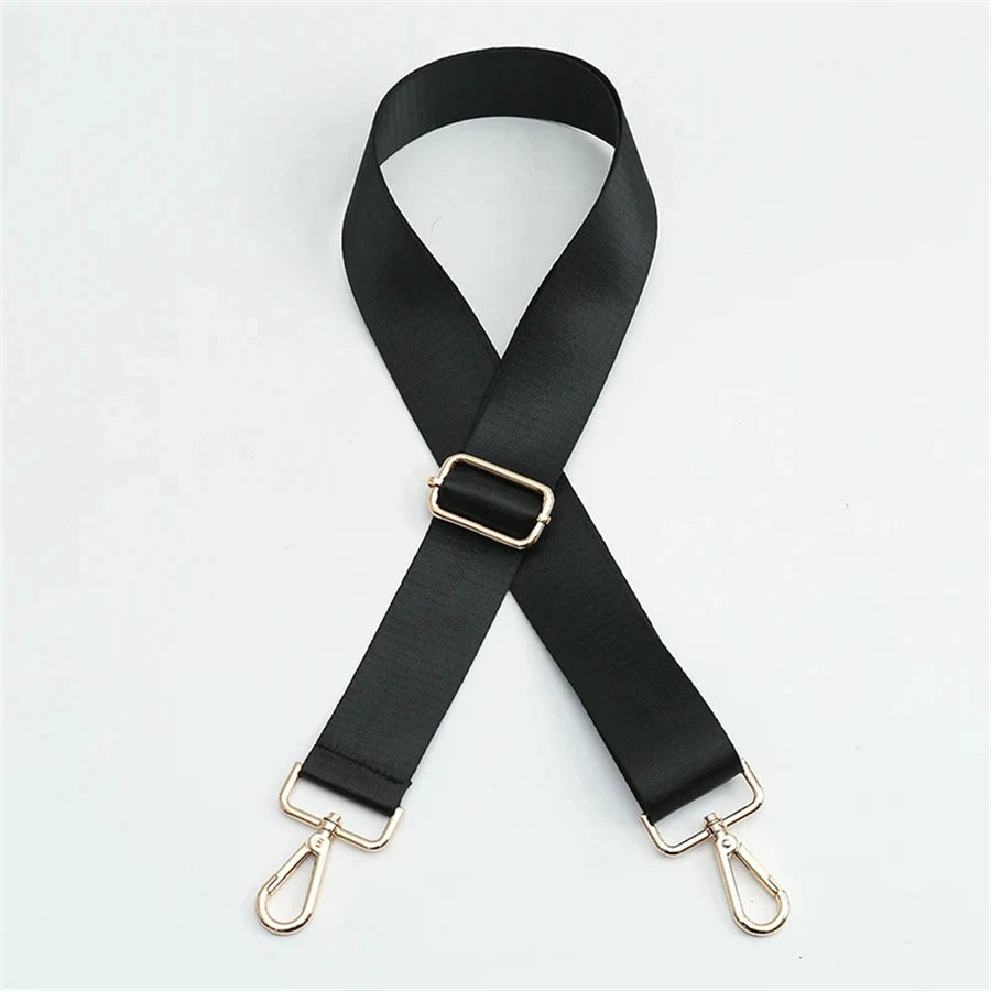Black adjustable nylon shoulder strap with gold-toned hardware