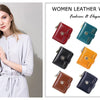 A collection of women's leather wallets in various colors including red, teal, brown, yellow, and pink.