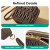 A brown quilted mini coin purse with a detachable handle and exquisite zipper details.