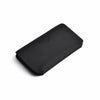 A black magnetic foldable ID card holder and coin purse shown from above.