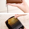 A brown RFID shielded accordion wallet with a gold chain is shown in various angles.