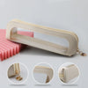 A beige portable transparent cosmetic organizer pouch with a gold chain detail shown from multiple angles.