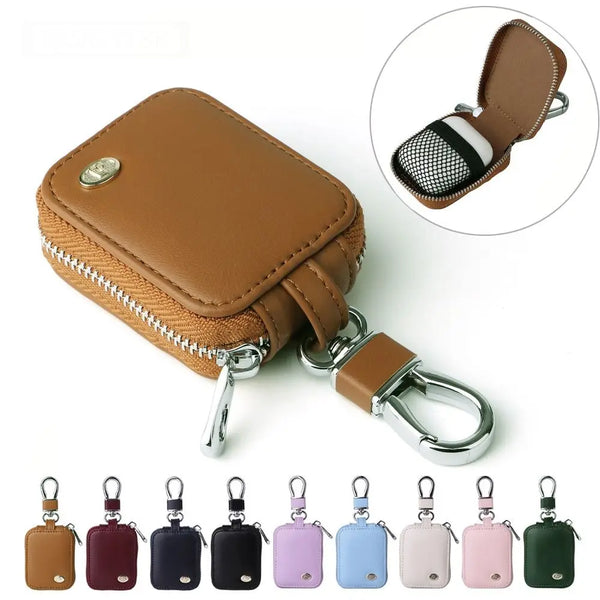 A collection of small protective cases for earphones in various colors and finishes.