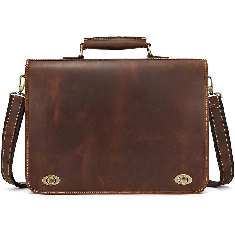 A brown vintage Crazy Horse leather briefcase with a leather handle and strap.