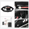A black felt organizer insert for handbags showing various compartments and accessories.