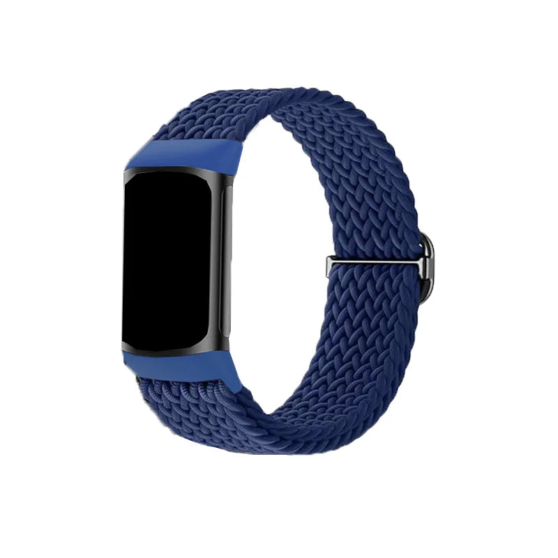 A dark blue stretchy nylon watch band for a Fitbit device.