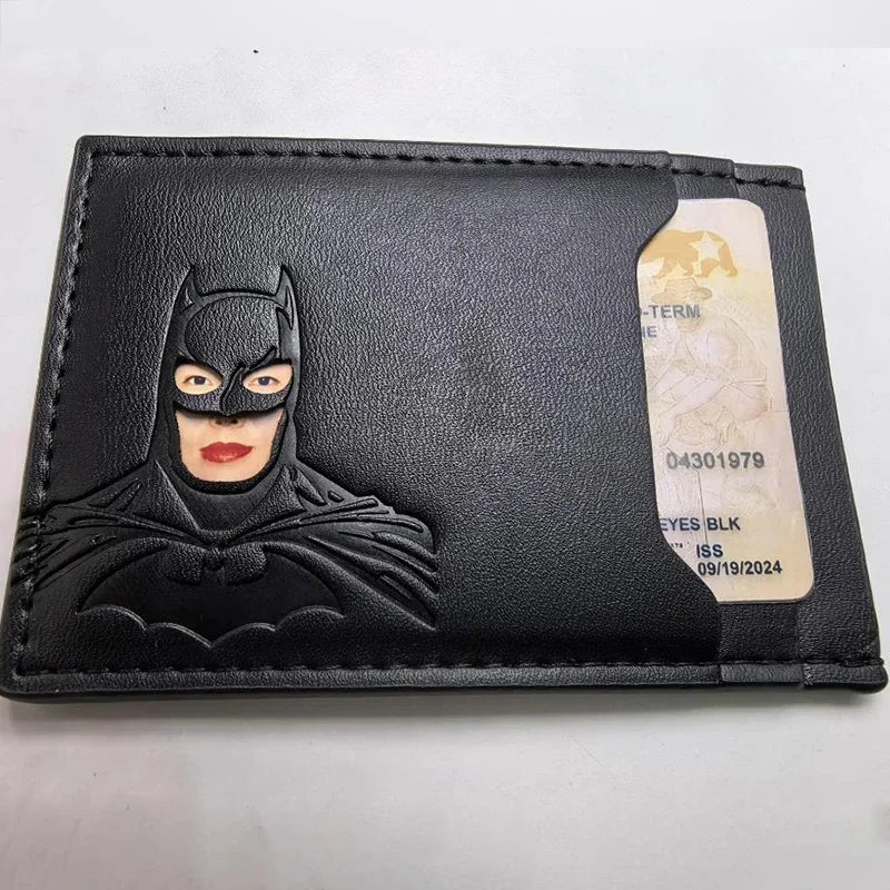 Black leather card holder featuring a Batman cowl design and an identification tag.