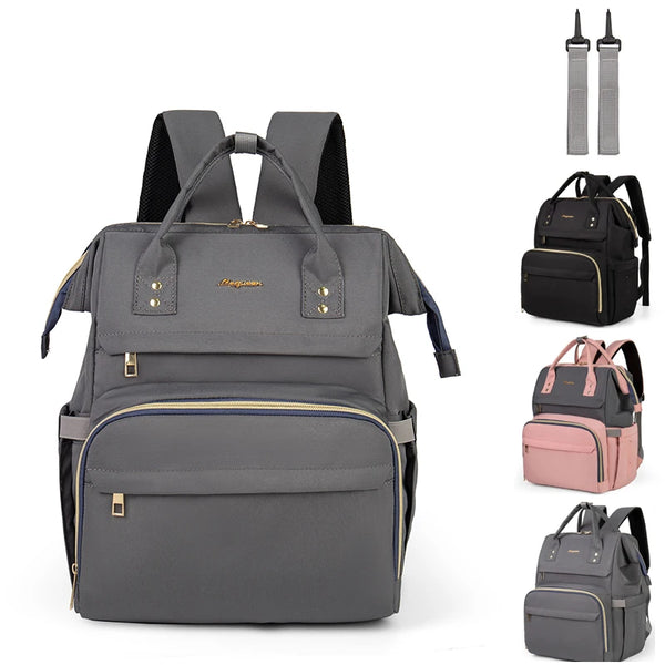 A gray maternity diaper and nursing bag with multiple compartments and accessories.