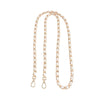 A delicate gold-toned chain strap with a small loop closure for bags.