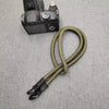 A black FinePix camera with an adjustable strap is shown against a gray background.