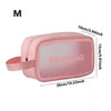 A pink clear waterproof travel toiletry bag with measurements shown.