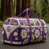 A purple quilted travel duffle bag with a white and yellow daisy pattern and a peace sign emblem.