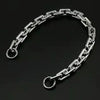 Silver acrylic purse chain strap for shoulder bags displayed against a black background.