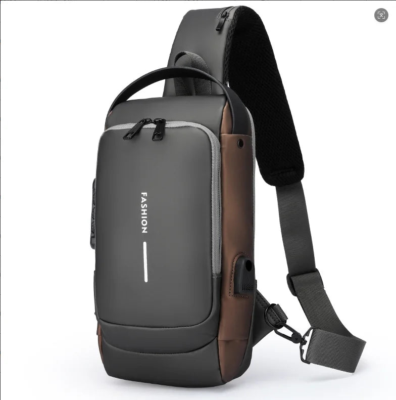 A dark gray anti-theft crossbody chest bag with a brown accent and black strap.