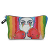 A colorful cosmetic storage pouch featuring a face design with dripping paint and bright stripes.